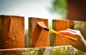 Can I paint my fence while it rains